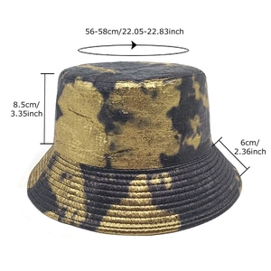 Reversible bucket hat with gold foil tie-dye pattern and detailed size specifications