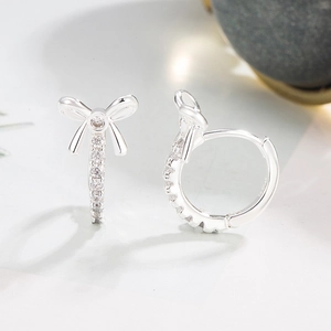 Silver S925 sterling silver bow knot earrings with sparkling cubic zirconia inlay
