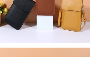 Three leather crossbody phone bags in black, brown, and yellow with metallic buckles