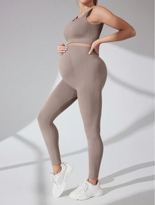 Seamless maternity yoga set with supportive high-waist leggings and sports bra in brown grey