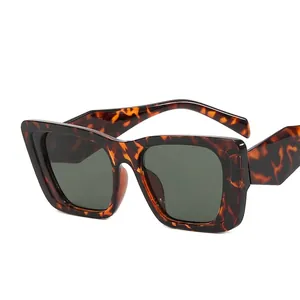 Vintage oversized square tortoiseshell sunglasses with dark lenses and metal hinges