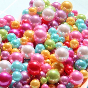 Mix of colorful high-gloss ABS faux pearls in various sizes for DIY craft decorations