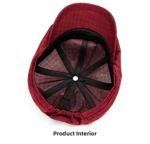 Detailed internal view of burgundy newsboy hat showing sweatband and elastic lining