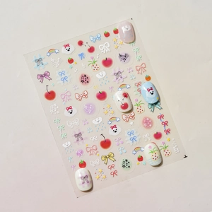 Cute hand-drawn nail art stickers with bow, bear and cloud patterns for DIY manicure