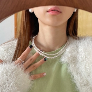 925 silver double-layer pearl necklace and stud earrings set on a female model