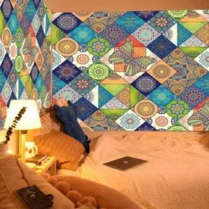 Detail of colorful mandala pattern tapestry with green butterflies for wall decor