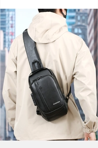 Waterproof black anti-theft sling bag with combination lock on male model back