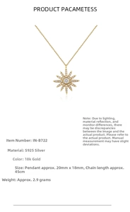 Detail of S925 silver sunburst star pendant with white zircon and 18K gold finish