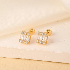 Detail view of gold copper stud earrings with square zircon stone and screw back design