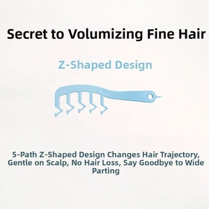 Close-up of the light blue Z-shaped hair comb with 5-way teeth for root volume and styling