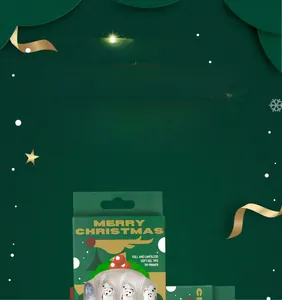 Detail of Christmas press-on nails set with snowman patterns in dark green window box