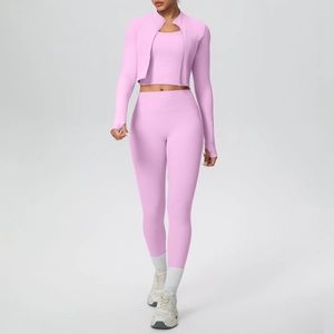 Three-piece pink yoga set with zip jacket, racerback tank, and high-waisted leggings