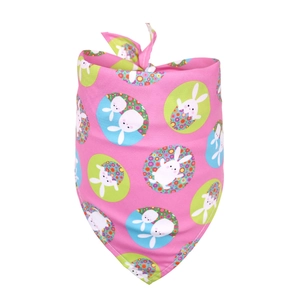Close-up of pink Easter pet bandana with white rabbit, egg, and floral patterns