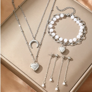 Silver-tone jewelry set with pearl heart moon necklace bracelet and tassel earrings