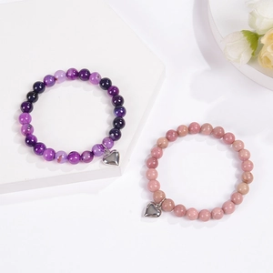 Natural agate beaded bracelets with heart pendants in purple and pink tones