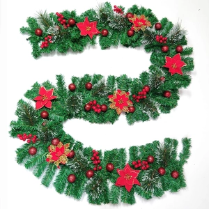 Detailed close-up of 2.7m luxury Christmas garland with red flowers and berries