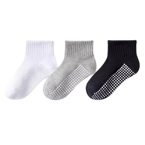 Three pairs of non-slip mesh cotton kids' socks in white, grey, and black colors