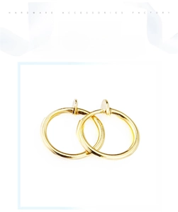 Detailed view of polished golden spring clip earrings for non-pierced ears