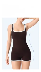 Close-up of ribbed yoga jumpsuit with contrast piping for anti-slip athletic fit