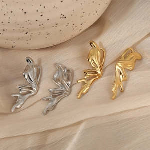 Lava fluid irregular metal earrings in gold and silver finish for a modern look