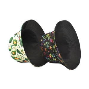 Reversible bucket hat with avocado and mushroom patterns for sun protection and style
