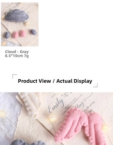 Detail view of felt cloud ornament with wings showing size dimensions and soft texture