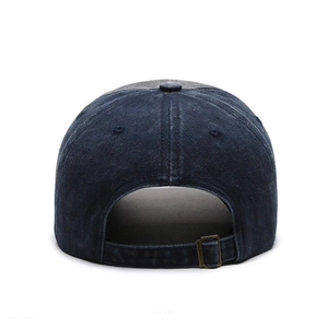 Adjustable back view of washed denim baseball cap with vintage bronze metal buckle strap