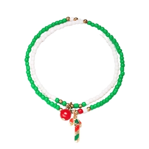 Christmas layered beaded bracelet with Santa candy cane charms on white background
