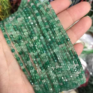 Macro shot of green faceted natural agate cylinder beads for DIY jewelry making