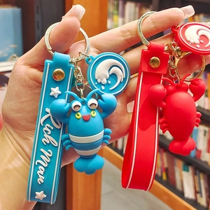 Cartoon lobster keychain set in red and blue with Rich Man wrist strap and gold clasp