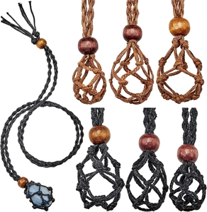 Detailed view of handmade woven black and brown cord necklace nets with wooden beads