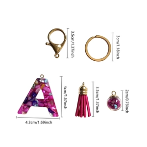 Pink resin alphabet A keychain with tassel and star sequin glass ball pendant set