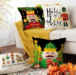 Detail of four Christmas nutcracker throw pillow covers on a cozy sofa setting