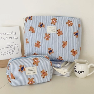 Blue striped quilted makeup bag set with cute bear print and white tassel zippers