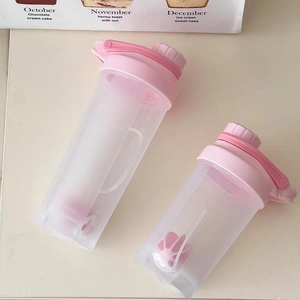 Pink protein shaker bottle set with mixing ball and volume scale for fitness