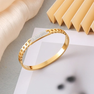 Elegant gold hollow strap bracelet with sparkling crystals and minimalist stainless steel finish