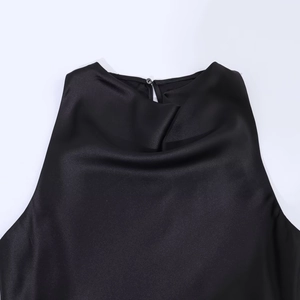 Elegant black satin off-shoulder dress with a draped halter neckline and button detail