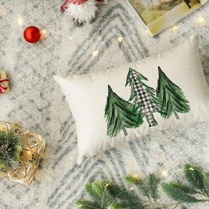 Rectangular linen Christmas pillowcase with stylized trees on a cozy festive carpet
