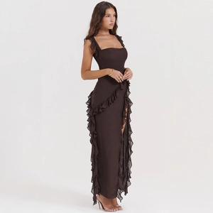 Detail of dark brown tiered ruffle dress with high side slit and backless design