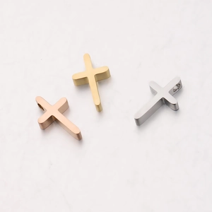 Polished stainless steel cross charms in rose gold, gold, and silver finishes