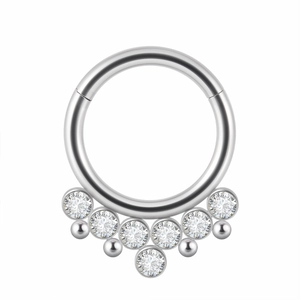 Polished silver stainless steel septum ring featuring sparkling round gems and metal beads