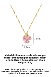 Detail of pink heart-shaped crystal flower pendant with measurements on gold chain