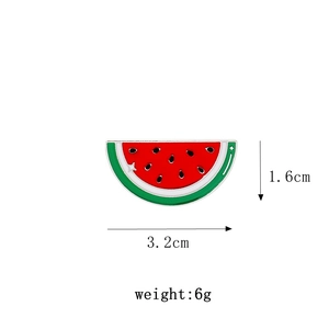 Detailed view of enamel watermelon pin dimensions 3.2cm by 1.6cm with 6g weight