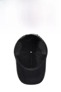 Detailed close-up of dark grey winter baseball cap featuring ear flaps and thermal lining