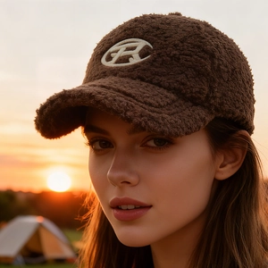 Women's brown faux fur baseball cap with embroidered logo for autumn and winter style