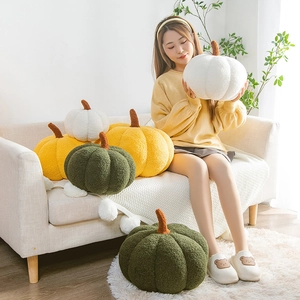 Nordic pumpkin plush pillows in white, yellow, and green colors for cozy home sofa decor