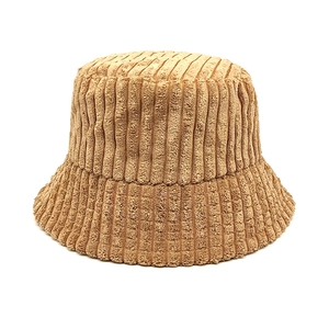 Close-up of the thick vertical stripe texture on this warm brown corduroy bucket hat