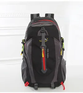 Front detail of outdoor backpack showing buckles, side straps and red zipper accents