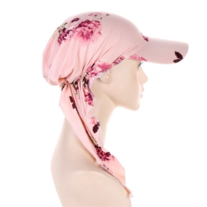 Detail view of pink floral headscarf with curved brim and long adjustable ribbon ties