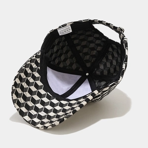 Baseball cap with 3D black and white geometric pattern and adjustable back strap